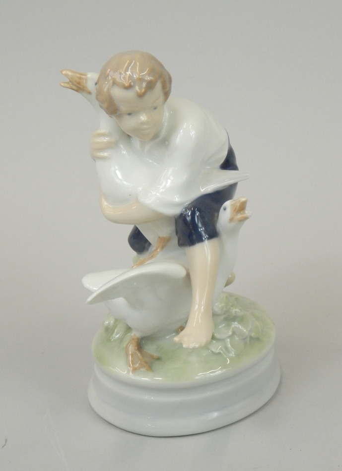 Appraisal: A Royal Copenhagen figure of a boy and geese number