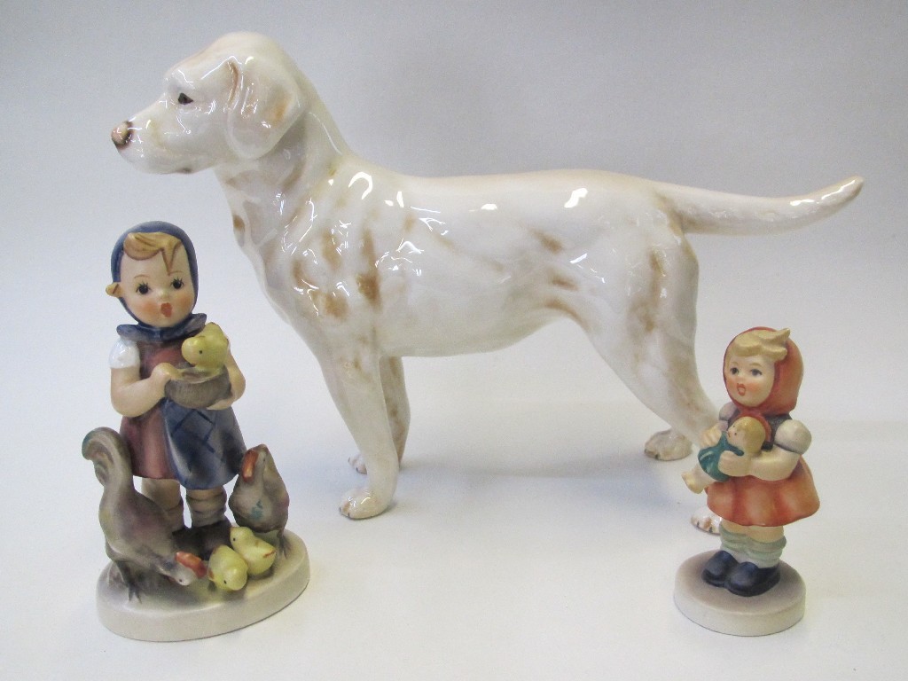 Appraisal: Goebel figure of a golden labrador and two Hummel figures