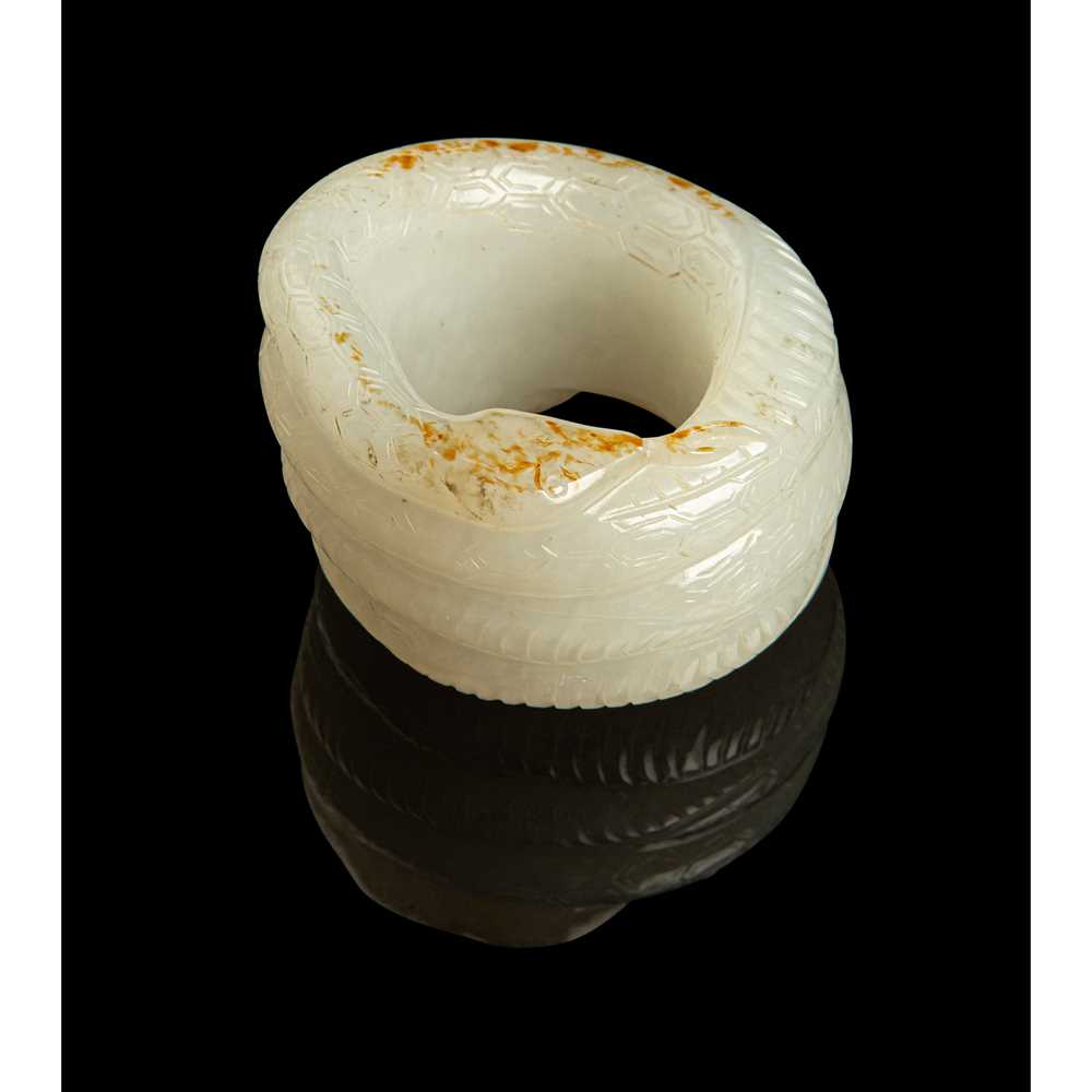 Appraisal: WHITE JADE WITH RUSSET SKIN 'SERPENT' THUMB RING QING DYNASTY