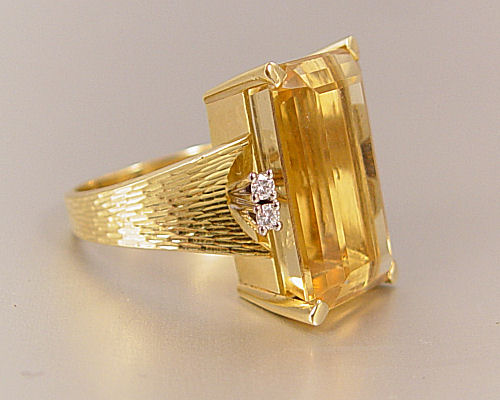 Appraisal: CT CITRINE RING WITH DIAMONDS K yellow gold ring contains