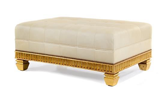 Appraisal: A Continental Style Leather Upholstered Giltwood Ottoman Height x width