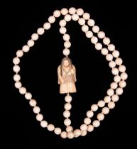 Appraisal: Beaded Ivory Netsuke Necklace Beaded ivory necklace with signed Netsuke