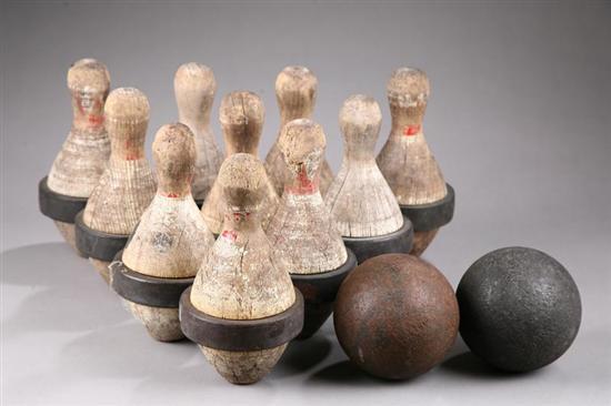 Appraisal: VINTAGE BOWLING SET Ten wooden pins with traces of old