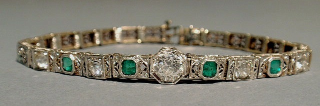 Appraisal: Diamond and emerald bracelet in a k white gold filigree