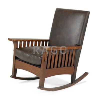 Appraisal: L J G STICKLEY Slat-arm rocker Oak leather and brass