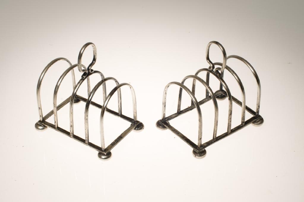 Appraisal: PAIR OF GEORGE V SILVER TOAST RACKS CHESTER each with