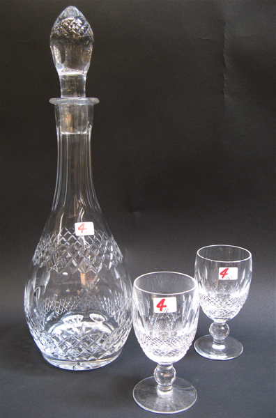 Appraisal: THREE PIECE CUT CRYSTAL DECANTER SET including the slender wine