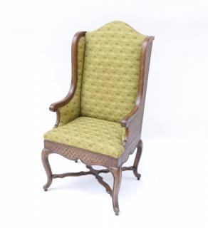 Appraisal: Provencial Wing Chair by Yale Burge th century incised decorated