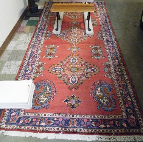 Appraisal: PERSIAN AREA RUG Sarouk design floral sprig and medallion decoration