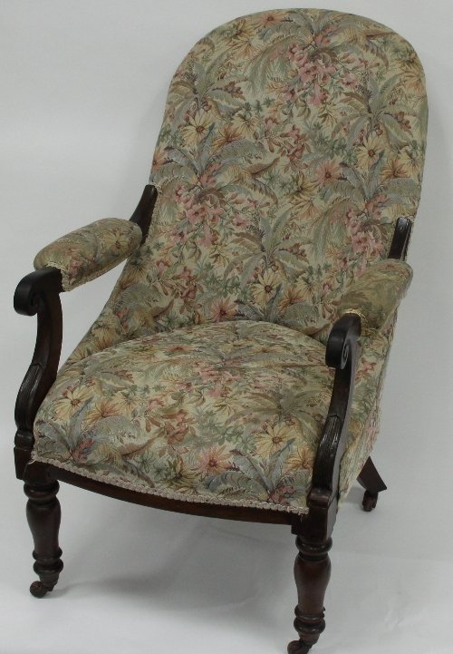 Appraisal: A William IV mahogany upholstered armchair with scroll arms and