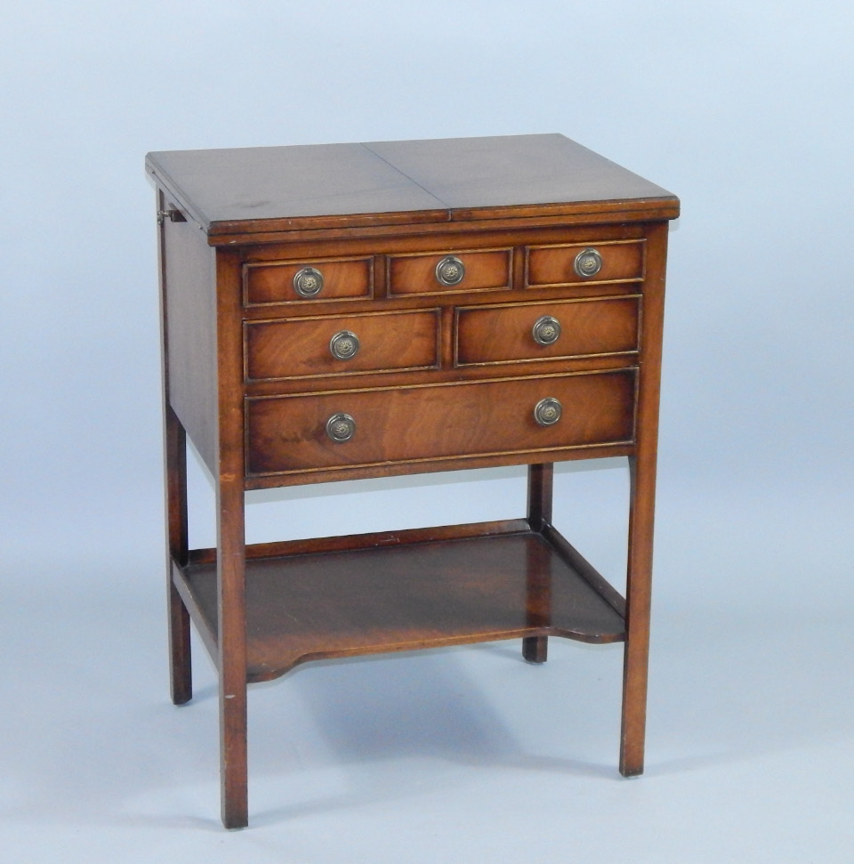 Appraisal: A mahogany chest with a double fold over top above