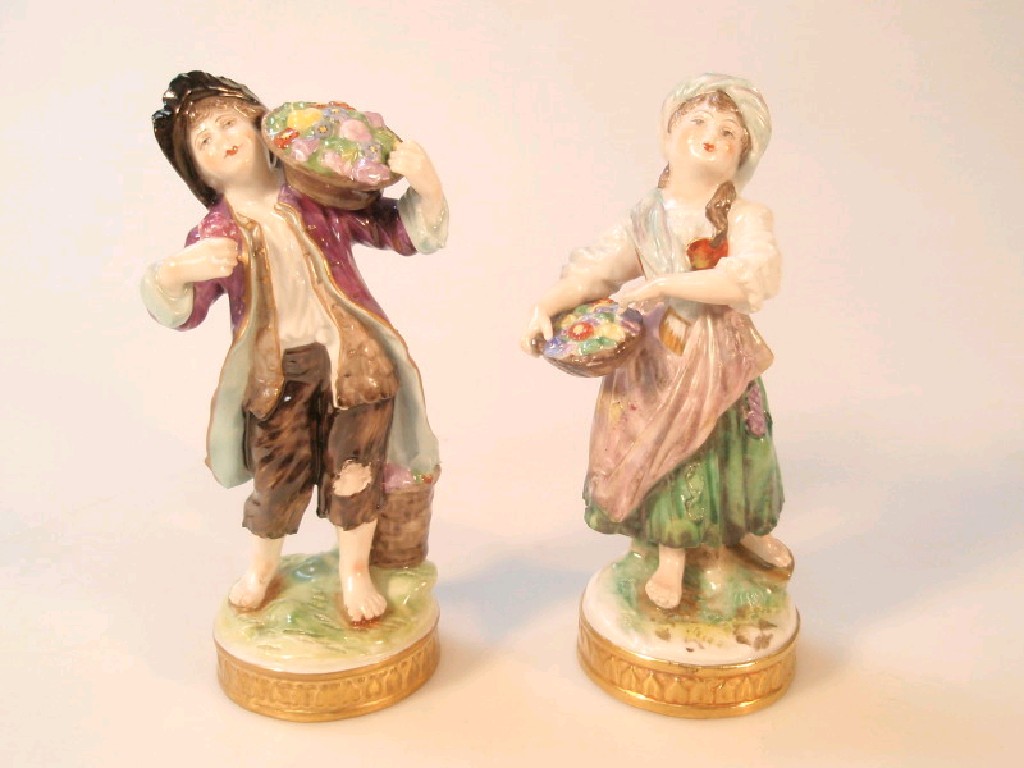 Appraisal: A pair of thC Sitzendorf porcelain figures of flower sellers