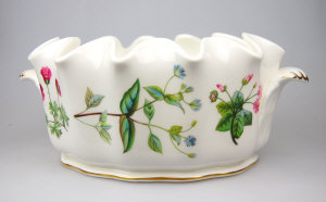 Appraisal: A contemporary Minton fluted oval two handle planter decorated with