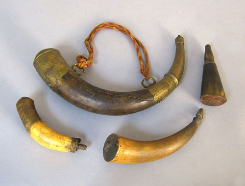 Appraisal: Powder horn with brass mounts together with three others