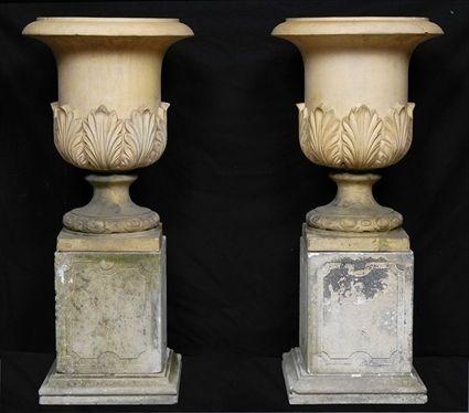 Appraisal: PAIR OF TERRACOTTA URNS The urns x in on in