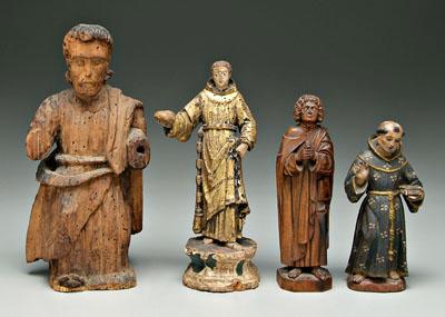 Appraisal: Four carved religious figures carved and polychromed wood one possibly