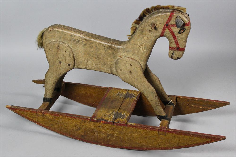 Appraisal: FOLK ART PAINT DECORATED WOODEN ROCKING HORSE the paint decorated