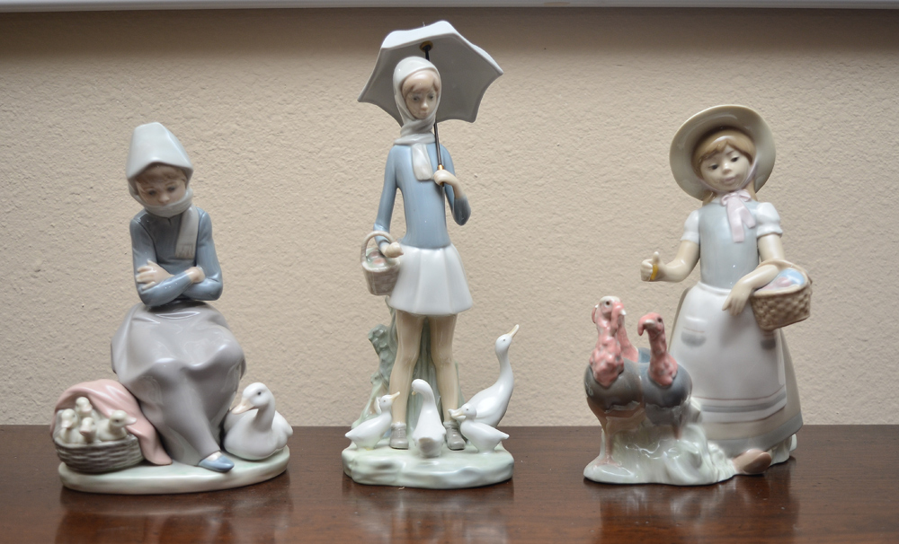 Appraisal: LLADRO PORCELAIN FIGURINES Three little girls with fowl Girl with