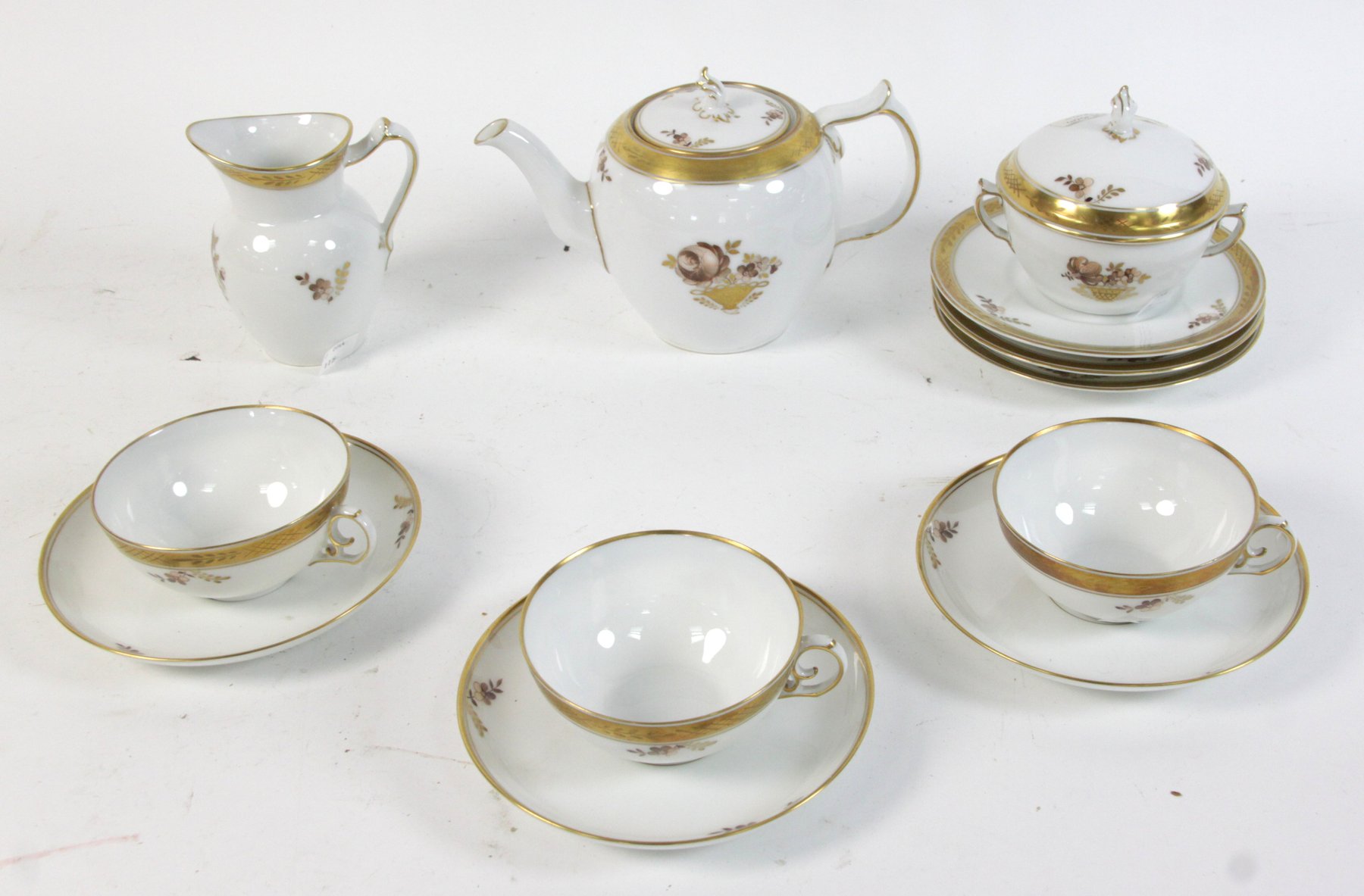 Appraisal: A Royal Copenhagen ' Brown Rose' part tea service teapot