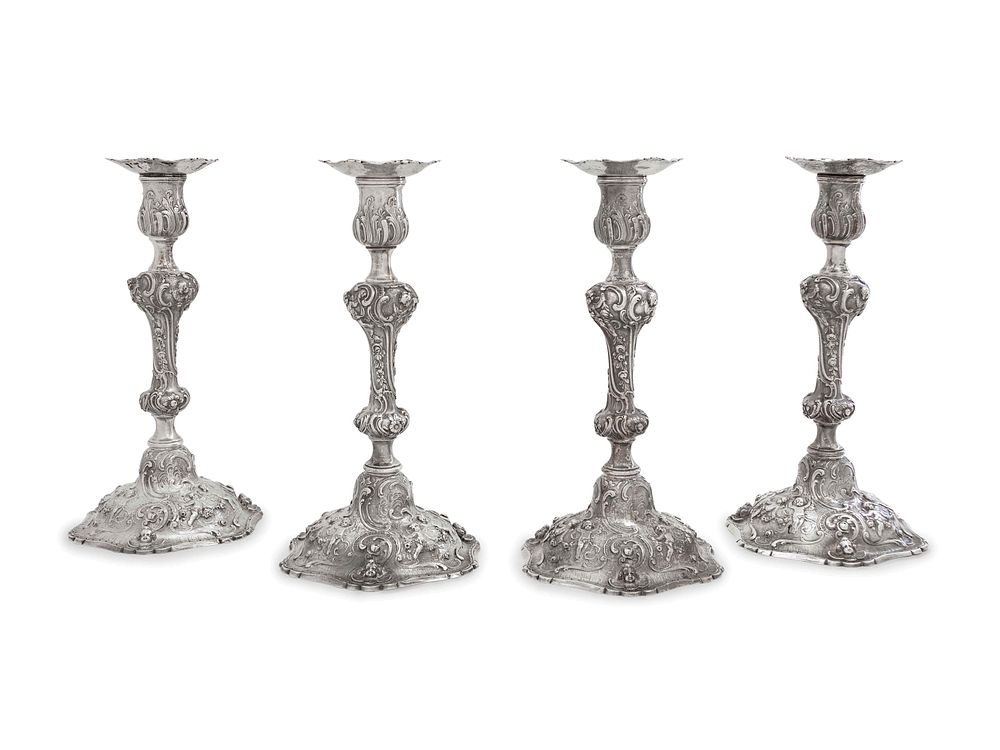 Appraisal: A Set of Four Rococo Revival Silver Candlesticks A Set