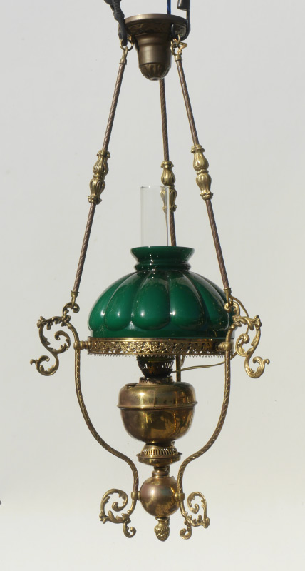 Appraisal: CASED GLASS SHADE BRASS HANGING LIGHT Electrified brass frame and