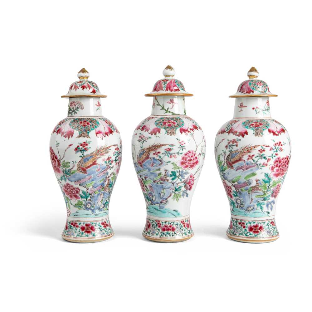 Appraisal: GROUP OF THREE FAMILLE ROSE LIDDED BALUSTER VASES QING DYNASTY