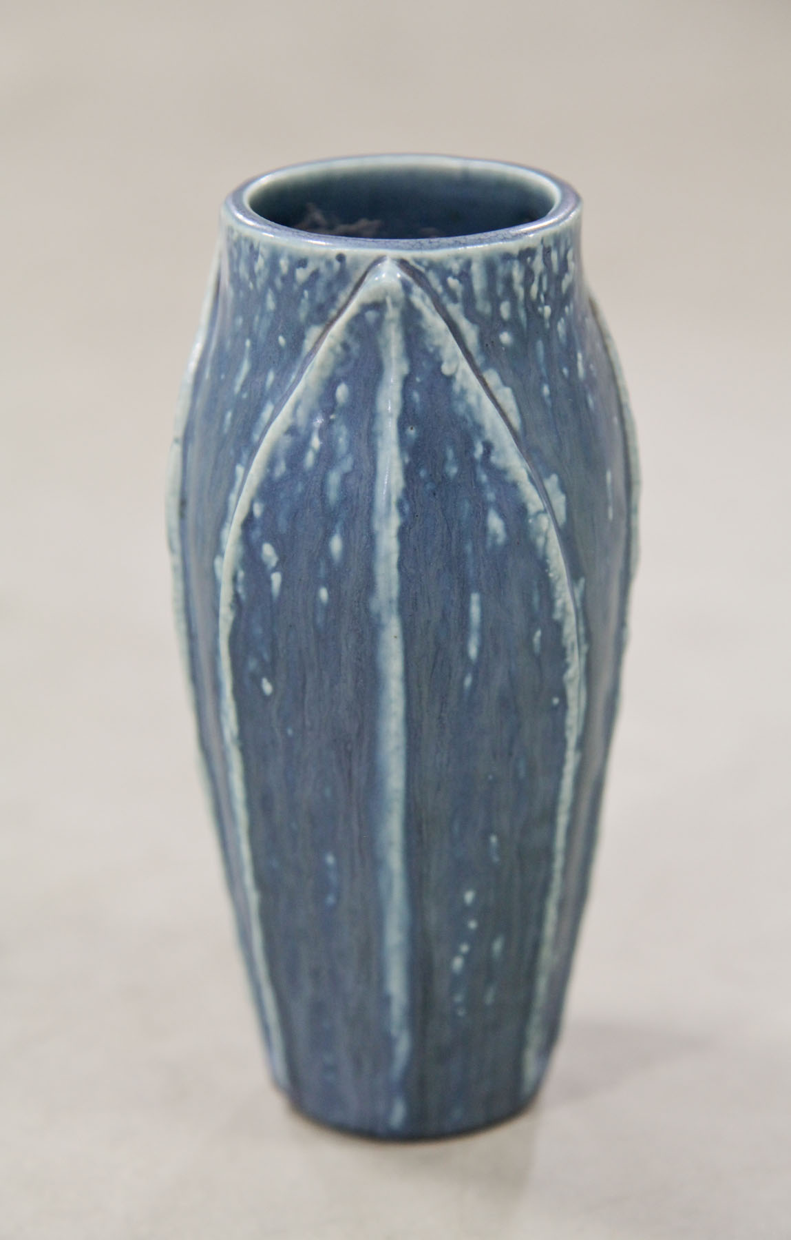 Appraisal: ROOKWOOD VASE Ohio Blue mottled glaze with vertical leaf mold