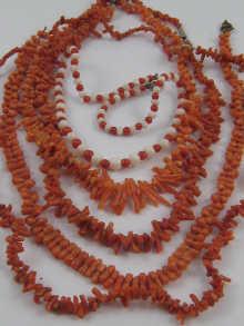 Appraisal: A mixed lot comprising four branch coral necklaces and a