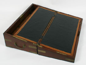 Appraisal: Mahogany lap desk with hinged slant lid leather writing surface