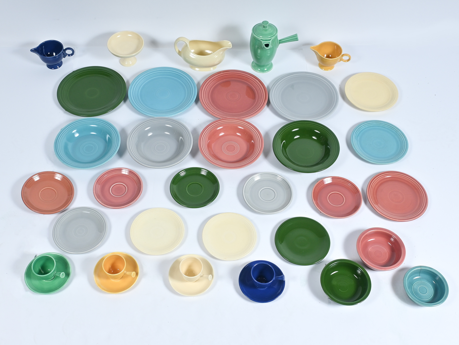 Appraisal: PC COLORFUL FIESTA WARE COLLECTION Comprising - Coffee Cup saucers