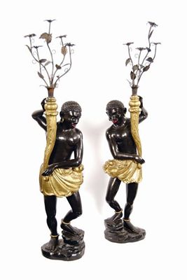 Appraisal: A pair of carved wood and painted blackamoor torcheres each