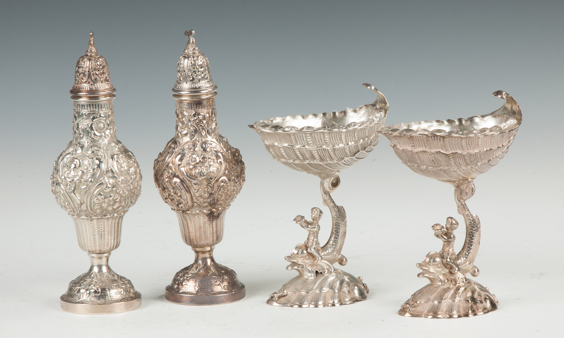 Appraisal: Continental Silver Casters Salts Master salts with dolphins glass inserts