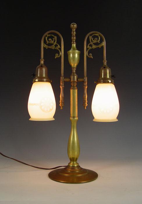 Appraisal: VINTAGE BRASS DESK LAMP Heavy brass two arm lamp with