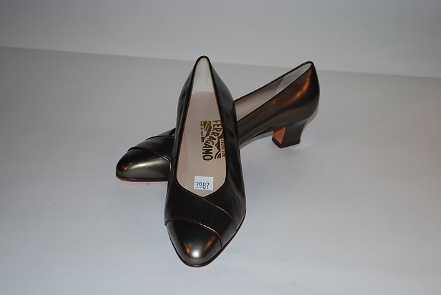 Appraisal: Salvatore Ferragamo platinum kid pumps with bronze accent Size B