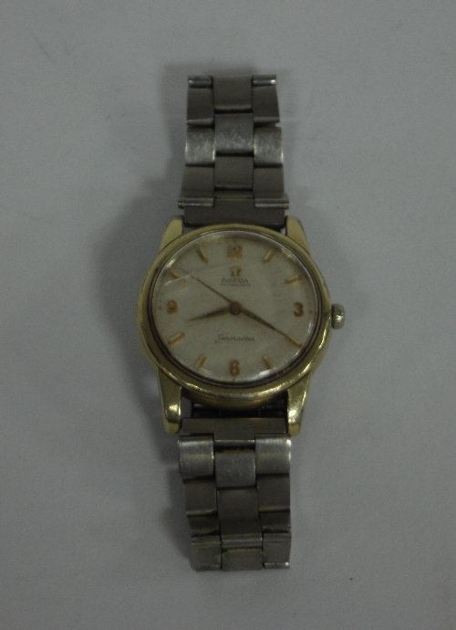 Appraisal: An Omega automatic seamaster wristwatch with Arabic quarter numerals in