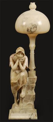 Appraisal: A carved alabaster figural table lamp a lady seated on