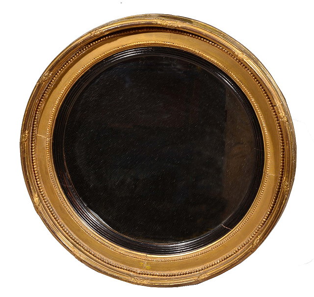 Appraisal: th Century gilt circular wall mirrorwith ebonised slip cm diameter