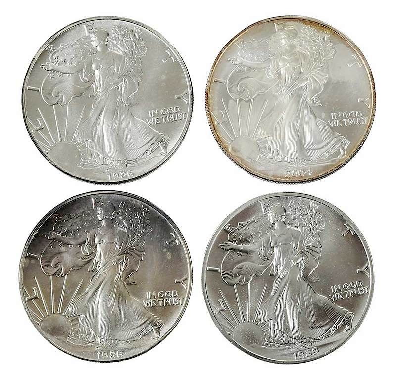 Appraisal: Four Rolls American Silver Eagles total coins various dates Provenance