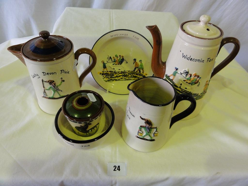 Appraisal: A collection of Torquay Pottery wares including relief moulded examples