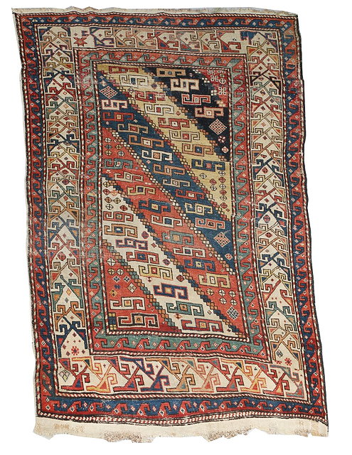 Appraisal: AN ANTIQUE CAUCASIAN TRIBAL RUG decorated with a polychrome diagonal