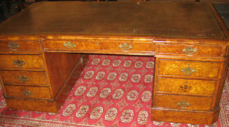 Appraisal: ANTIQUE ENGLISH BURL WALNUT EXECUTIVE DESK Large shaped top inset