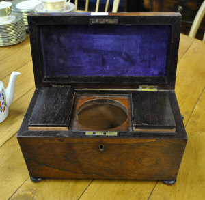 Appraisal: An early th century rosewood sarcophagus tea caddy with plate