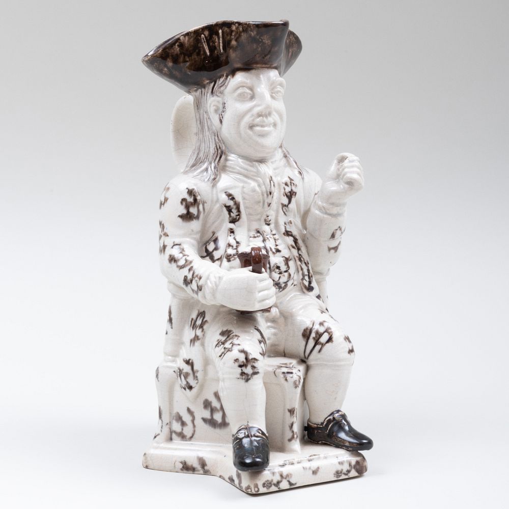 Appraisal: Staffordshire Wood Family Type Toby Jug in high Sold Stair