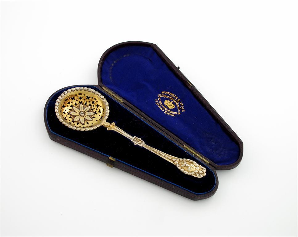 Appraisal: A Victorian silver-gilt sugar sifting spoon