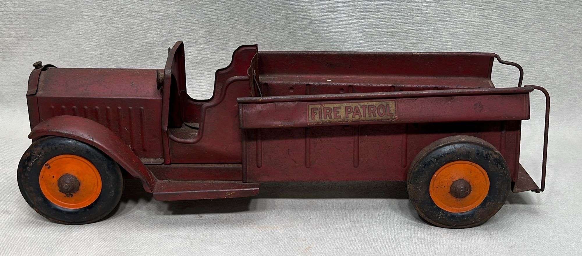 Appraisal: Structo Fire Patrol pressed steel truck toyearly th century appx