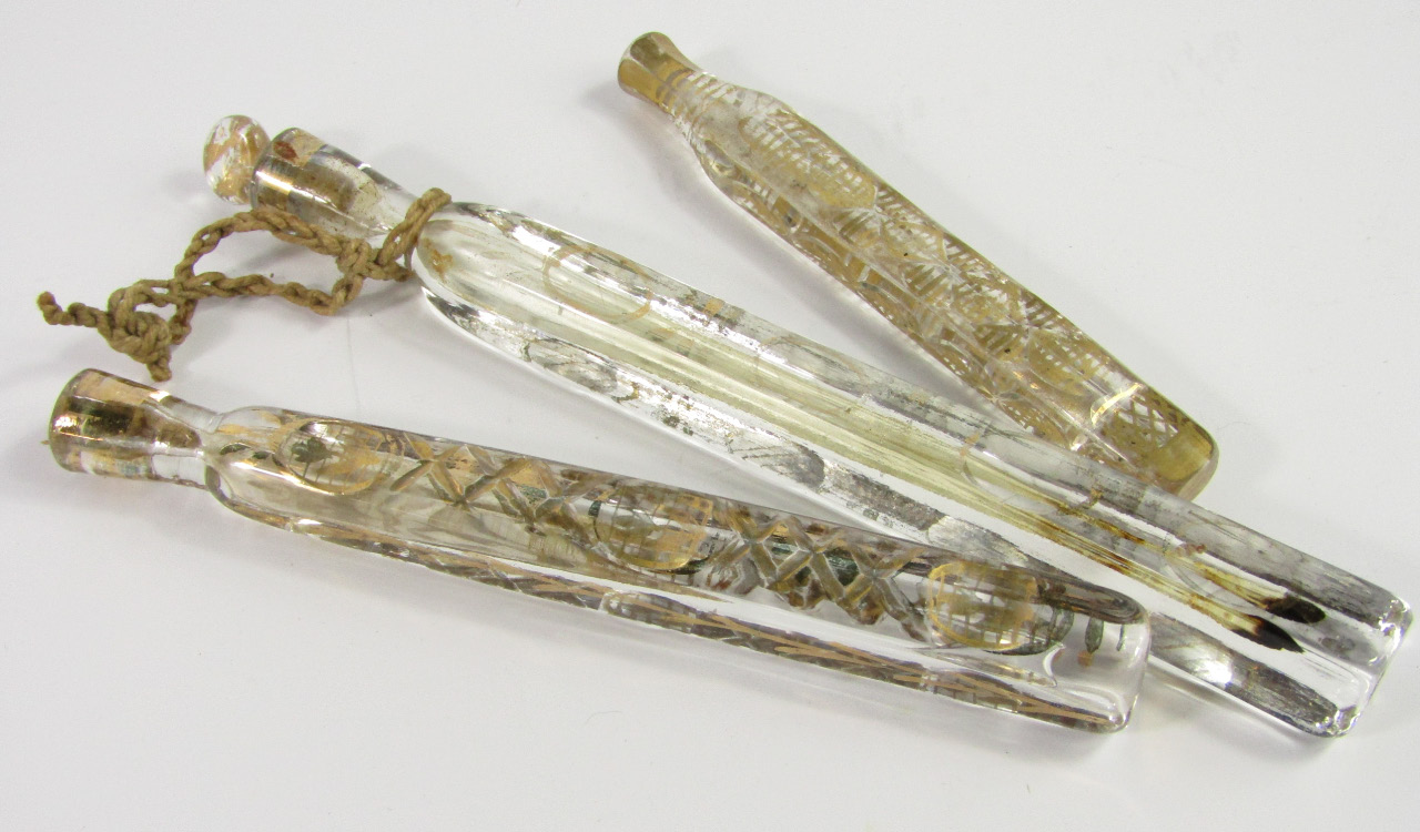 Appraisal: Three Georgian cut glass scent bottles with faceted and gilt