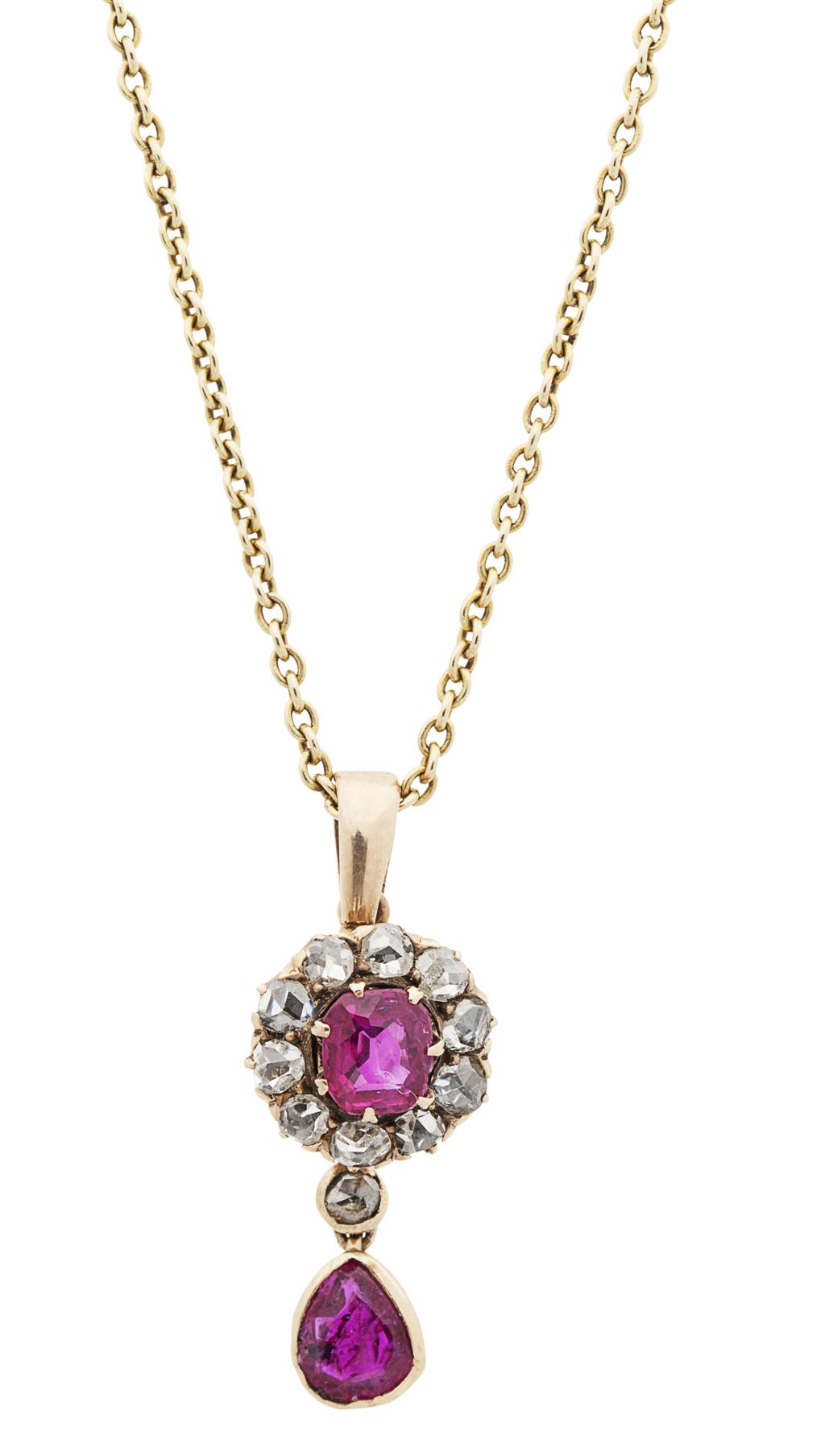 Appraisal: A ruby and diamond set pendant the central cluster composed