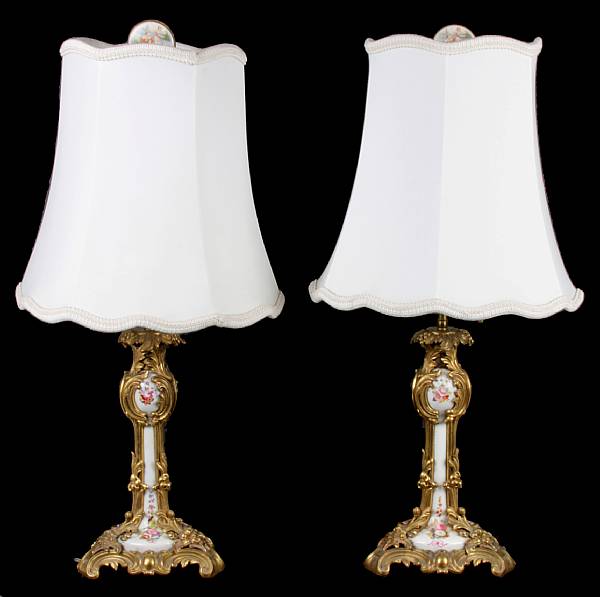 Appraisal: A pair of Louis XVI style gilt bronze mounted porcelain