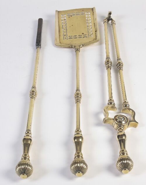 Appraisal: A set of three Regency brass fireirons comprising shovel tongs