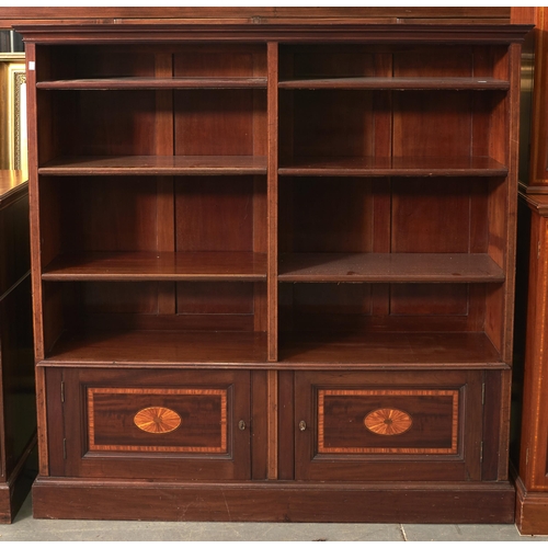 Appraisal: An Edwardian mahogany and inlaid open bookcase fitted with adjustable